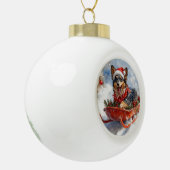 雪のクリスマスを許可するスロッジのベルギーシェパード セラミックボールオーナメント (左)