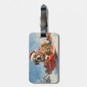 雪のクリスマスを過ごすソリに包まれたボクサー犬 ラゲッジタグ (裏面縦)