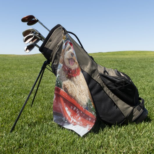 雪のクリスマスを過ごすソリのコックパウドッグ ゴルフタオル (グリーン)