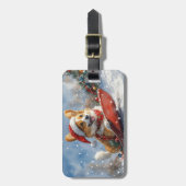 雪のクリスマスを過ごすソリのコルギ犬 ラゲッジタグ (正面縦)