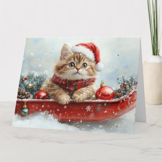 雪のクリスマスを過ごすソリのペルシャ猫 カード (正面)