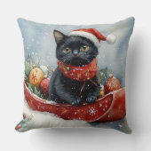 雪のクリスマスを過ごすソリの黒猫 クッション (正面)