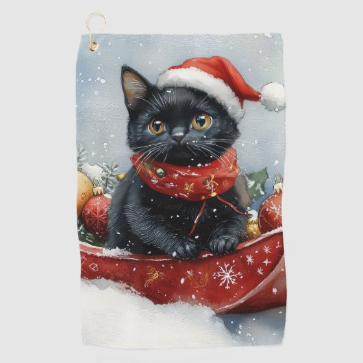 雪のクリスマスを過ごすソリの黒猫 ゴルフタオル (正面)