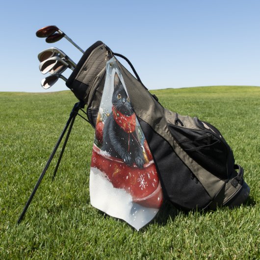 雪のクリスマスを過ごすソリの黒猫 ゴルフタオル (グリーン)