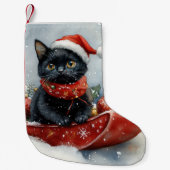 雪のクリスマスを過ごすソリの黒猫 スモールクリスマスストッキング (正面)