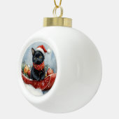 雪のクリスマスを過ごすソリの黒猫 セラミックボールオーナメント (右)