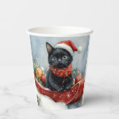 雪のクリスマスを過ごすソリの黒猫 紙コップ (裏面)