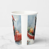 雪のクリスマスを過ごすソリの黒猫 紙コップ (左)