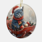 雪のクリスマスを過ごすソリ姿のオリエンタルブルー猫 セラミックオーナメント (左)