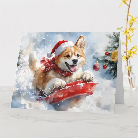 雪のクリスマスを過ごす秋田犬 カード (黄色い花)