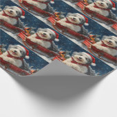 雪のクリスマスを過ごす英国の眠り犬 ラッピングペーパー (角)