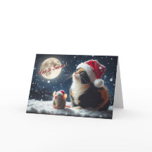 雪のクリスマスカードを見ているネコとネズミ