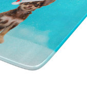 雪のクリスマスチワホアドッグ帽子をかぶって カッティングボード (角)