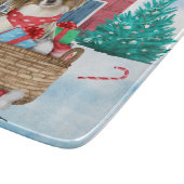 雪のクリスマスドッグハウスのパピロン犬 カッティングボード (角)