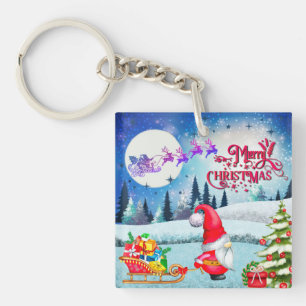 雪のクリスマスノームとサンタのそりギフト キーホルダー