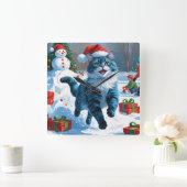 雪のクリスマスハットに座るオリエンタルブルー スクエア壁時計 (ホーム)