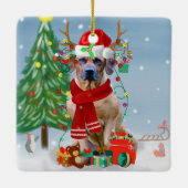 雪のクリスマスプレゼントにローデシアンのリッジバックドッグ セラミックオーナメント (裏面)