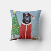 雪のクリスマスプレゼントに黒いドイツの羊飼い犬 クッション (裏面)