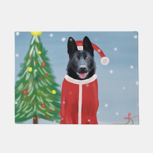 雪のクリスマスプレゼントに黒いドイツの羊飼い犬 ドアマット (正面)