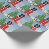 雪のクリスマスプレゼントに黒いドイツの羊飼い犬 ラッピングペーパー (角)