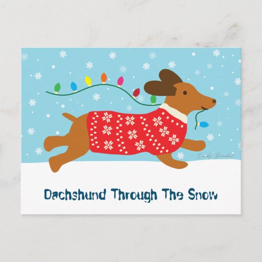 雪のクリスマスホリデーを通してかわいいダックスシュント シーズンポストカード (正面)