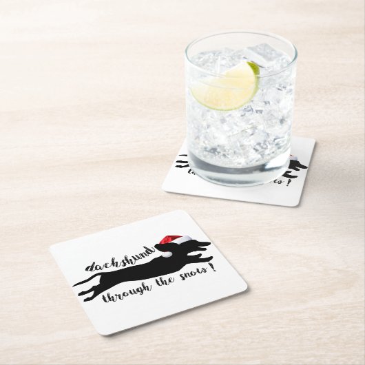 雪のクリスマス休暇を通じてダックスシュント スクエアペーパーコースター (インサイチュ)