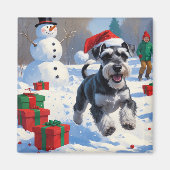 雪のクリスマス帽子をかぶったシュナウザー マグネット (正面)