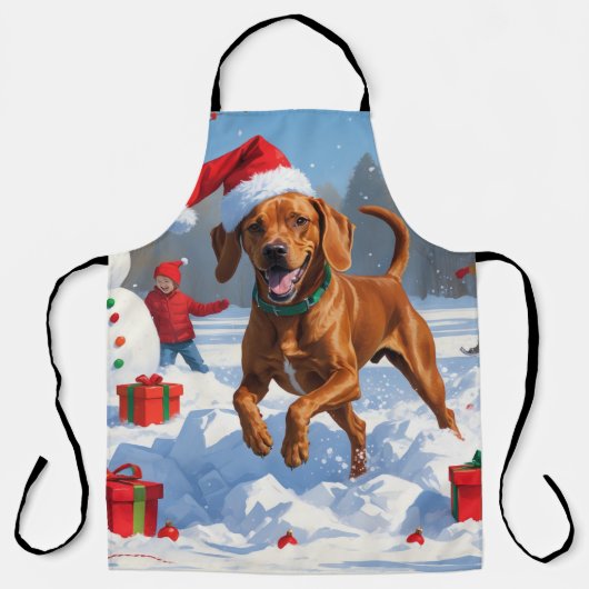 雪のクリスマス帽子をかぶったビズスラのラン エプロン (正面)