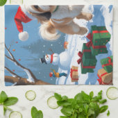 雪のクリスマス帽子をかぶったラサ・アプソ キッチンタオル (折り畳み)