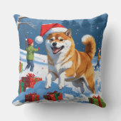 雪のクリスマス帽子をかぶった柴犬が走る クッション (正面)