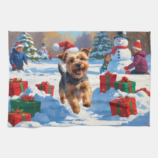雪のクリスマス帽子を被ったスカイテリアが走る キッチンタオル (横)
