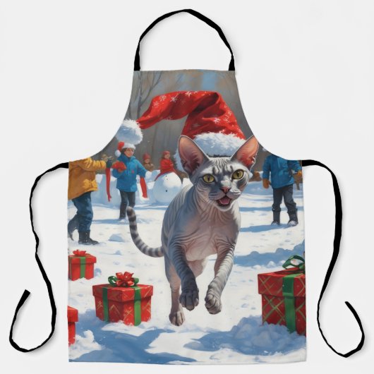 雪のクリスマス帽子を被ったスフィンクス猫が走る エプロン (正面)
