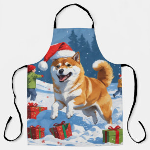 雪のクリスマス帽子を被った柴犬が走る エプロン