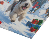 雪のクリスマス走ハットの古い英語シェプドッグの帽子 カッティングボード (角)