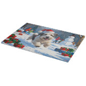 雪のクリスマス走ハットの古い英語シェプドッグの帽子 カッティングボード (角)