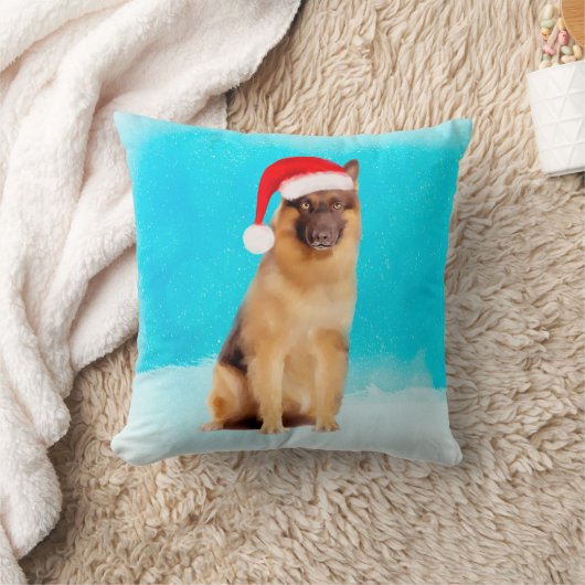 雪のサンタハットに座っているドイツの羊飼いの犬 クッション (ブランケット)