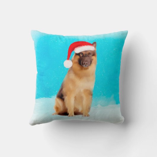 雪のサンタハットに座っているドイツの羊飼いの犬 クッション (裏面)