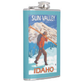 雪のスキーヴィンテージ旅行2を運んでいるスキーヤー フラスク (右)