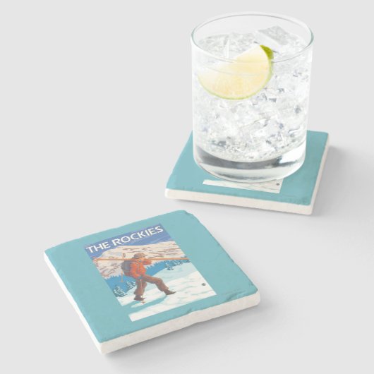 雪のスキー-ロッキー山脈--を運んでいるスキーヤー ストーンコースター (横)