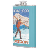 雪のスキー-山のフード--を運んでいるスキーヤーまたは フラスク (左)