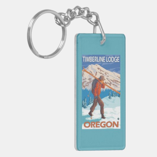 雪のスキー-樹木限界線ロッジ--を運んでいるスキーヤーまたは キーホルダー (正面左)