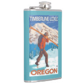 雪のスキー-樹木限界線ロッジ--を運んでいるスキーヤーまたは フラスク (右)