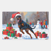 雪のドーベルマン - クリスマス帽をかぶって疾走 長方形シール (正面)