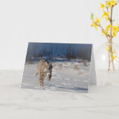 雪のボブキャットのランニング カード (黄色い花)