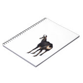 雪のミニマル上でアルパインシャモア山ヤギ ノートブック (左側)