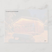 雪のログキャビンの美しいクリスマスライト シーズンポストカード (裏面)