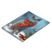 雪のロシアのクリスマスに青い猫 ノートブック (左側)