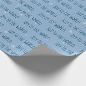 雪の上で世界の文字にクリスマスの喜び ラッピングペーパー (角)