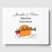 雪の上にサンタのトナカイの町の月を覆った ゲストブック (正面)