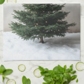 雪の上に柔らかい光を持つミニマルなクリスマスツリー キッチンタオル (折り畳み)